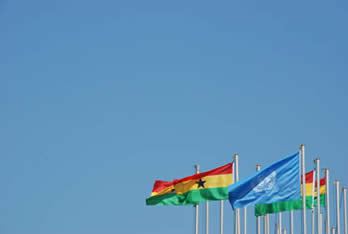 Ghanaian and UN flag outside confernce center 