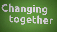 Changing together written on a banner