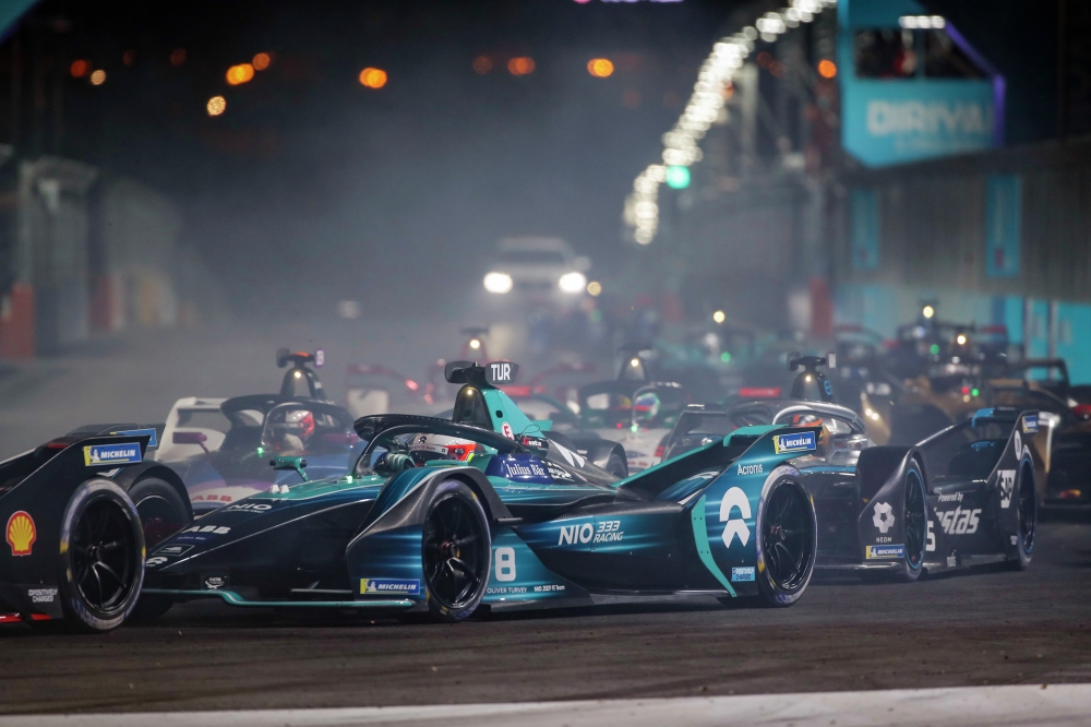 Image of a Formula E race - vehicles powered with green electricity