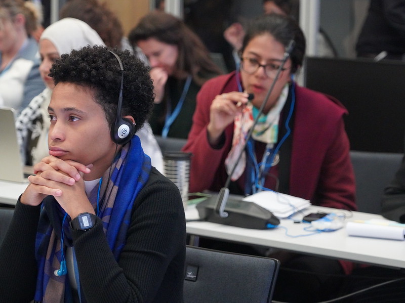 Delegates listen to a speaker at the June Climate Meetings
