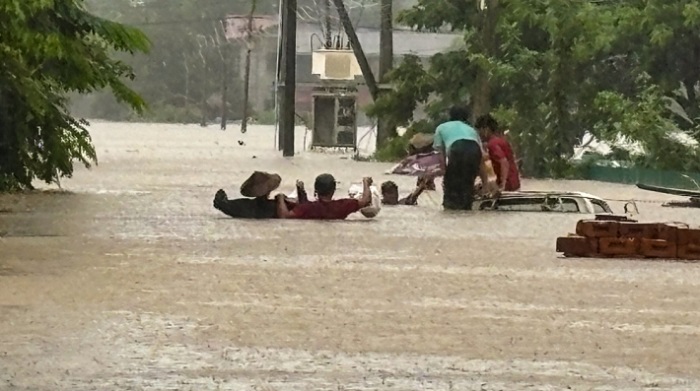Women amid flood in Kachin