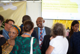 Man Smiling at an Event at Africa Climate Week 2022
