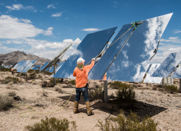 Contracted workers clean Heliostats at the Ivanpah Solar Project, owned by NRG Energy,
