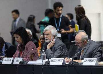 Delegates at COP27 attend the first high-level ministerial roundtable to discuss pre-2030 ambition