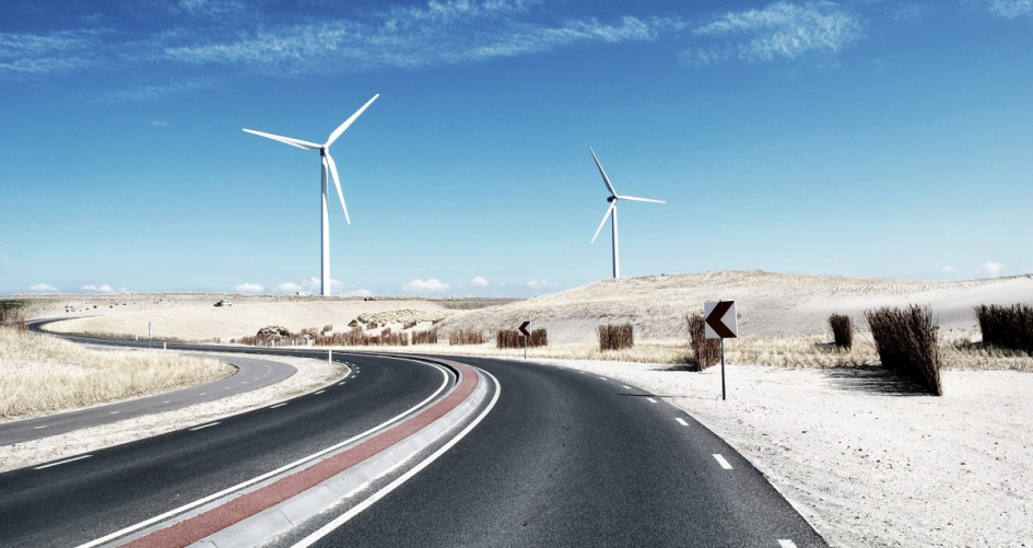 road and wind turbine with sky