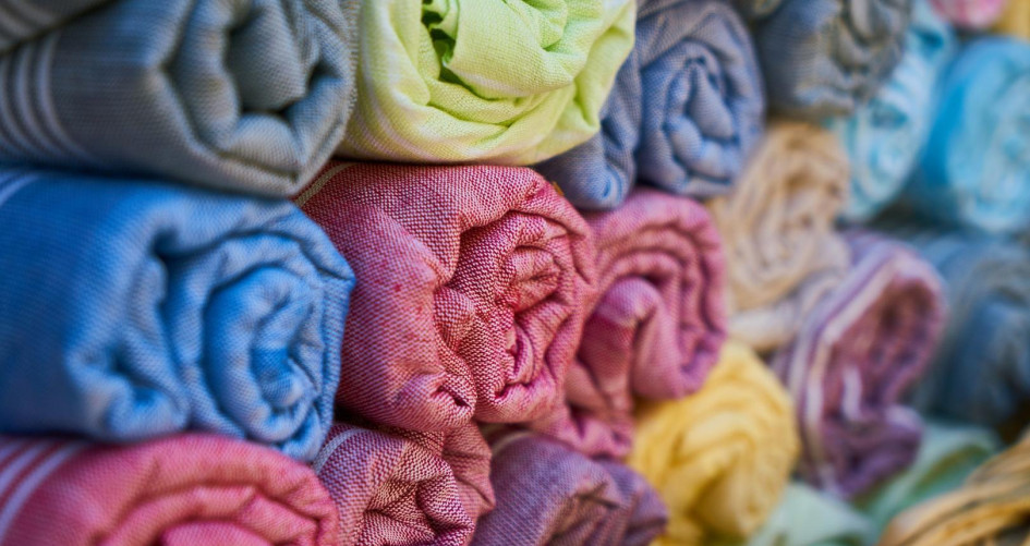 Image of colorful rolls of textiles