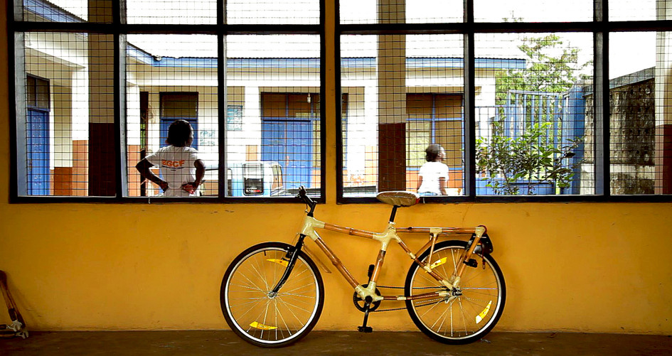 Picture of a Bamboo bike in front of a school in Ghana