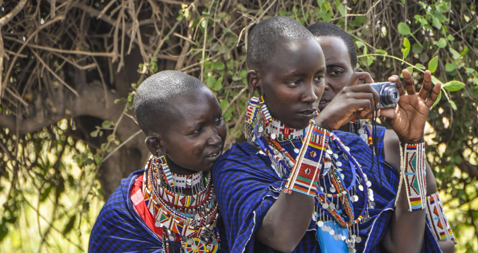 Girls using a camera