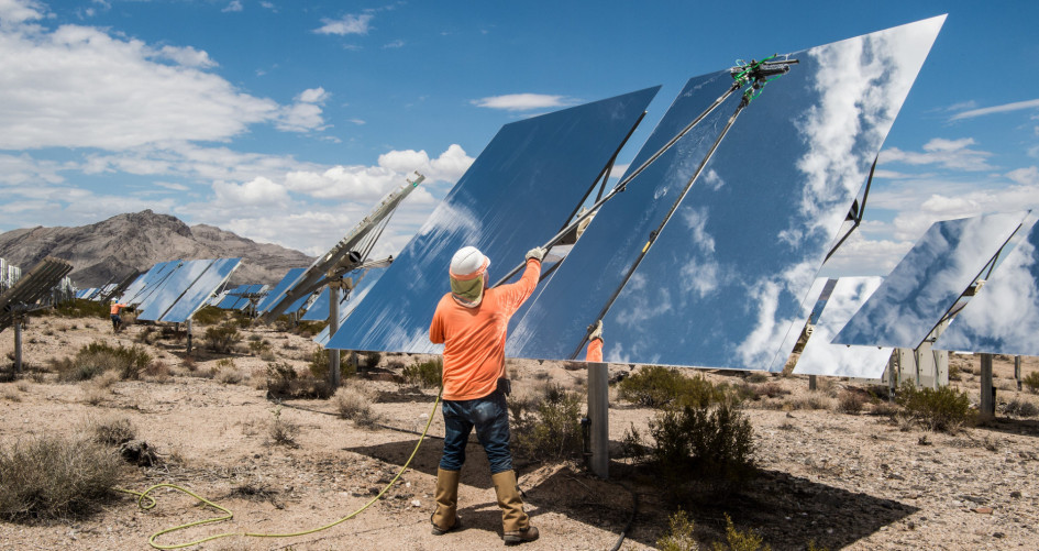Contracted workers clean Heliostats at the Ivanpah Solar Project, owned by NRG Energy,