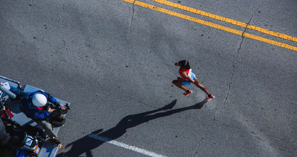 Woman running marathon.