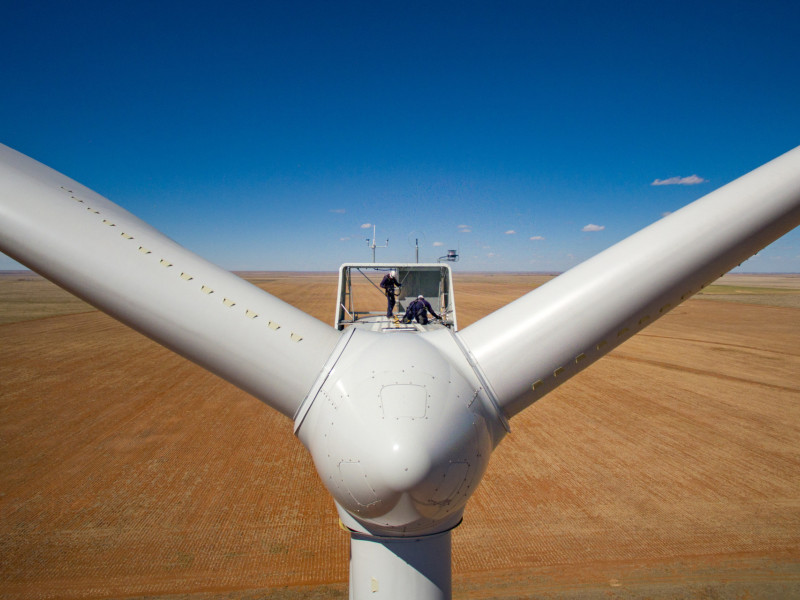 Operations and maintenance inspection on top of a wind turbine.