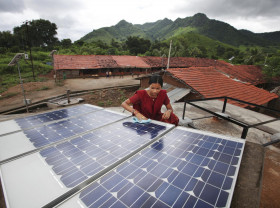 Woman with solar panels in India