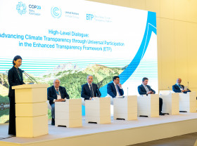 Zulfiya Suleimenova (left), Advisor to the President of Kazakhstan and Special Representative for International Environmental Cooperation, who has been appointed by the incoming COP President (third from left) as one of the ‘High Level Transparency Pair’, speaks during the opening of the Baku High-Level Dialogue on Climate Transparency.