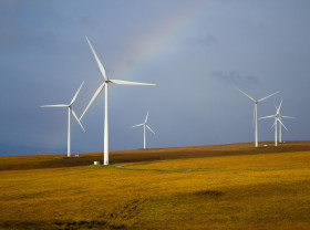 Windmills with a rainbow