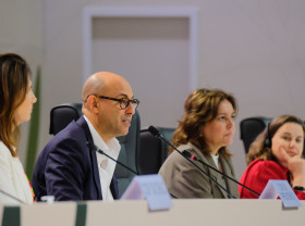 ES speaking at the GCA event